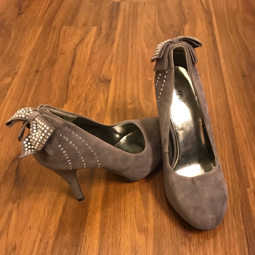 Gray suede pumps with silver rhinestoned bows